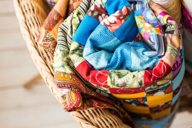 colorful quilt in a basket
