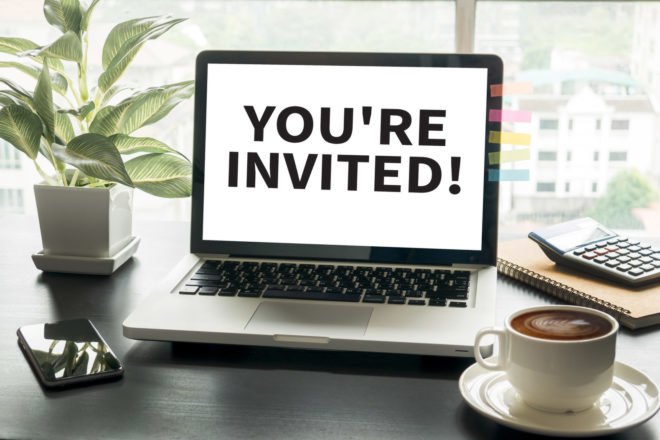 laptop screen reading, "You're Invited!"