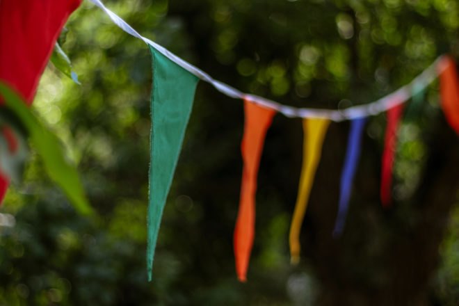 colorful pennant banner hanging up outside
