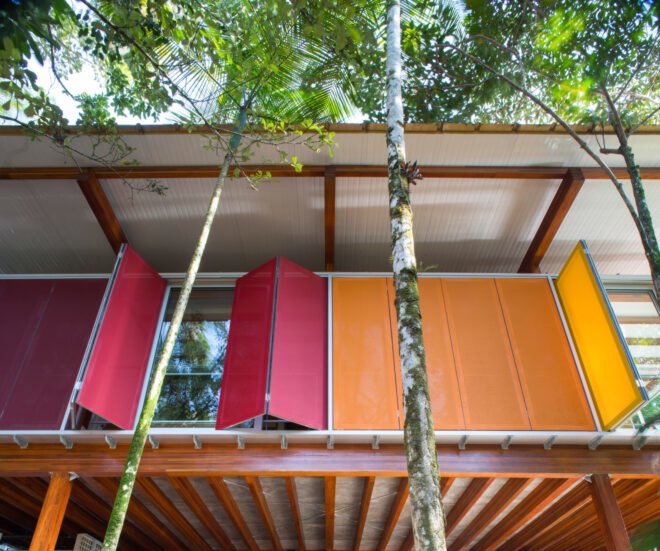 home exterior with colorful window shades