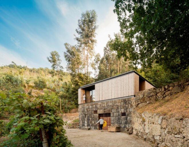micro home clad in timber on top of granite wine cellar