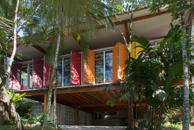 home exterior with colorful window shades