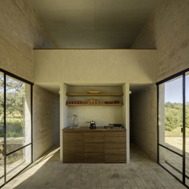 small kitchenette with wood cabinets