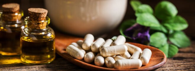 herbal pill capsules and natural oils