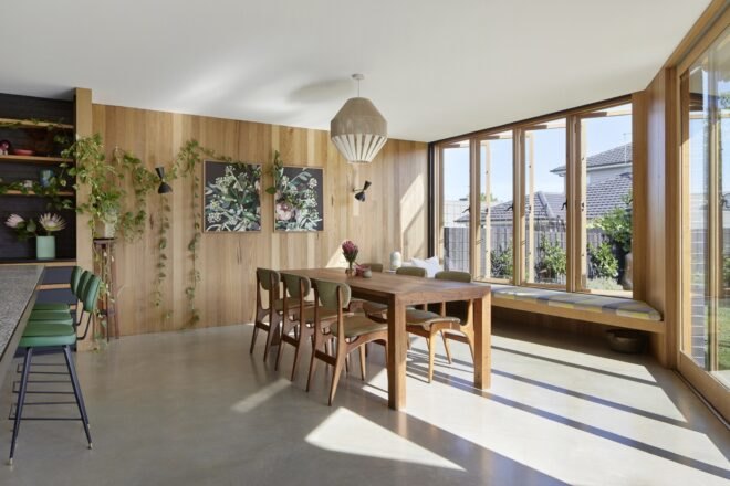 dinning area with wood table and walls