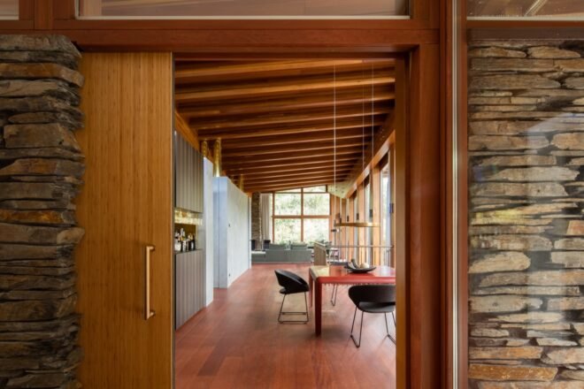 interior of home with wood floors, ceilings and beams