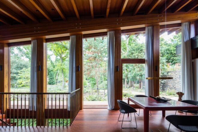 interior of home with wood floors, ceilings and beams