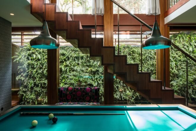 wood stairs and pool table