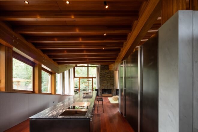 interior of home with wood floors, ceilings and beams