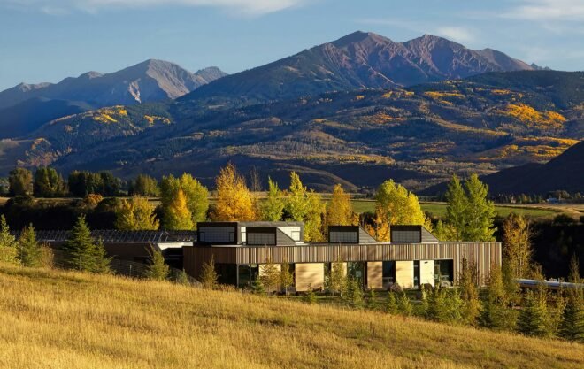 LEED certified building in Colorado surrounded by mountains and greenery