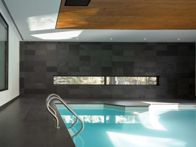 indoor swimming pool in gray room