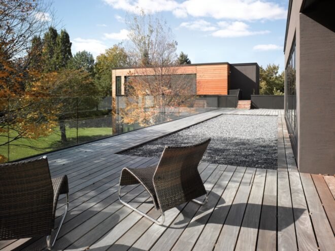 wood patio with two chairs