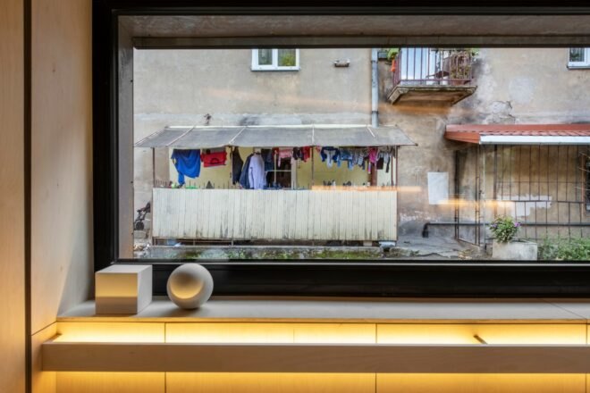 view from elongated window of laundry hanging to dry