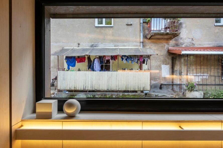 view from elongated window of laundry hanging to dry