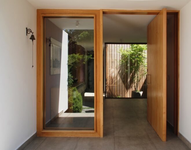 wooden door opening to home