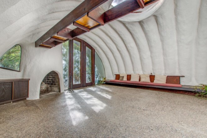 living room with curved roof and fireplace