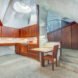 dining room with curved roof and skylight