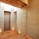 hallway of rammed earth home