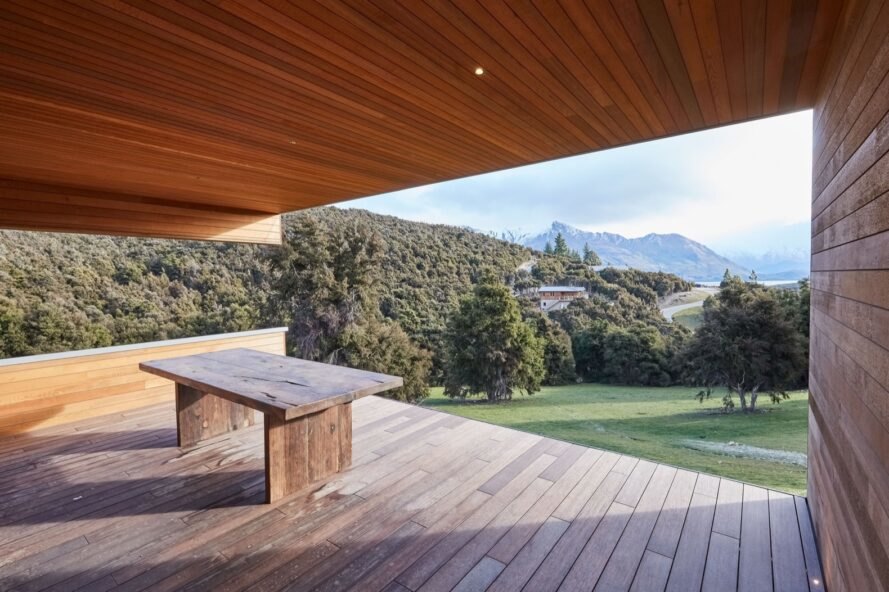 bench on an outdoor deck facing views of New Zealand