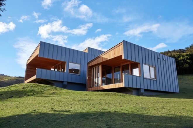 rammed earth home on a hill