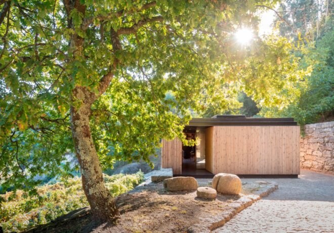 micro home clad in timber in the forest