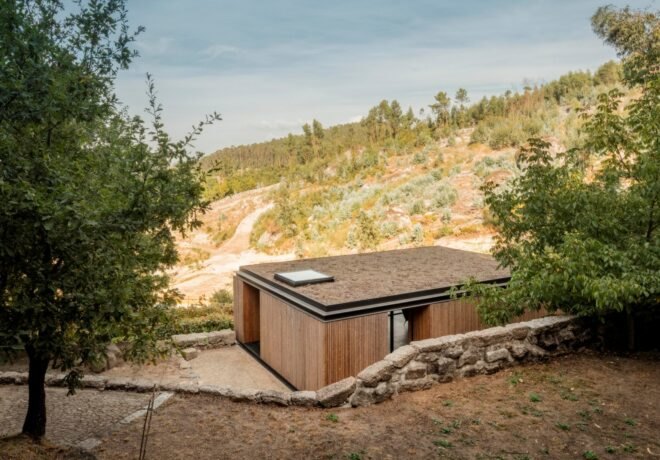 micro home clad in timber on a mountain