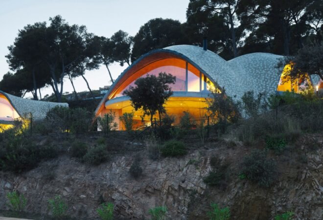 domed home with glazed front facade
