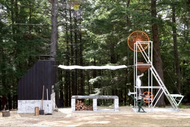 machine with large wheel and firewood