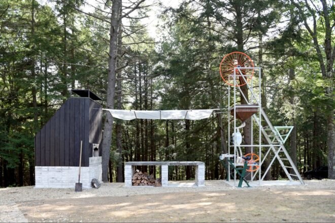 machine with large wheel and firewood
