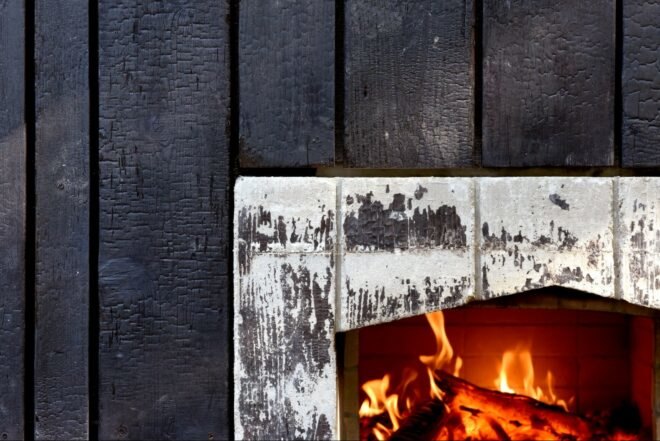 wood burning oven with charred wood exterior