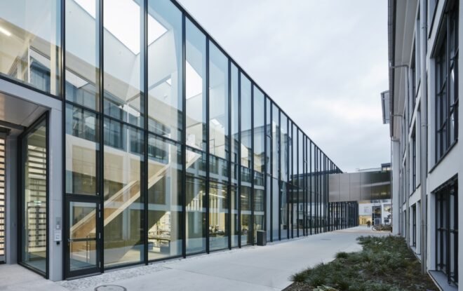 exterior of glass building with black metal framing