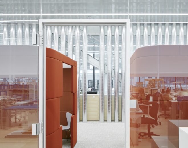 orange pods with work spaces inside