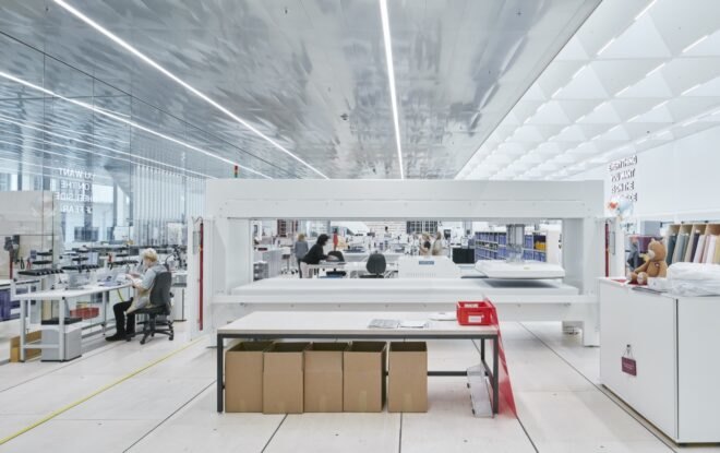 cardboard boxes under a white desk
