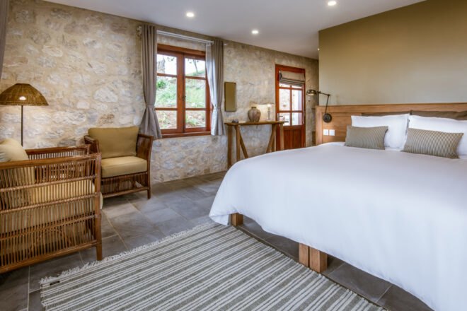 bungalow bedroom with large windows