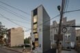 silver-clad tiny tower with many windows