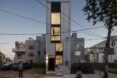 silver-clad tiny tower with windows