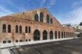 huge brick building with gabled roof