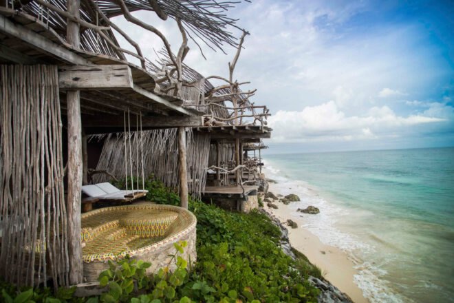 wood buildings overlooking the sea