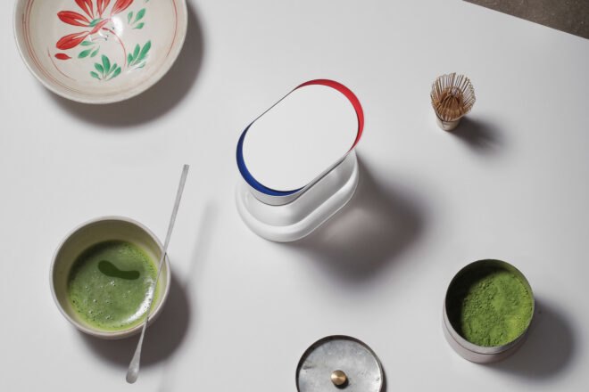 aerial view of white carafe near cup of matcha