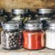 spices in glass jars on a shelf