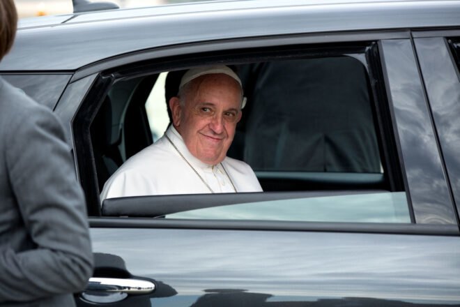 Pope Francis in a car