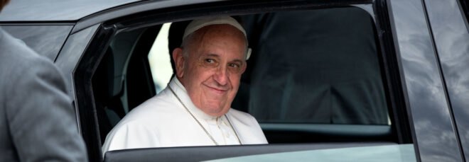 Pope Francis in a car