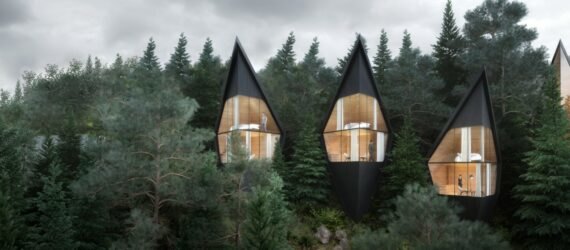 black triangular treehouses with huge glass walls