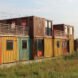 multi-colored shipping containers turned into home