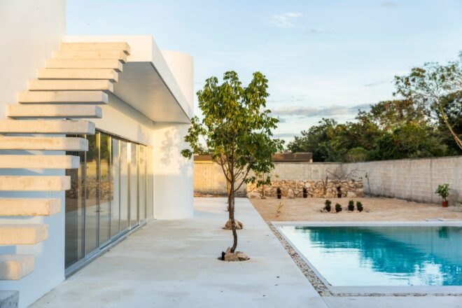 white home with swimming pool