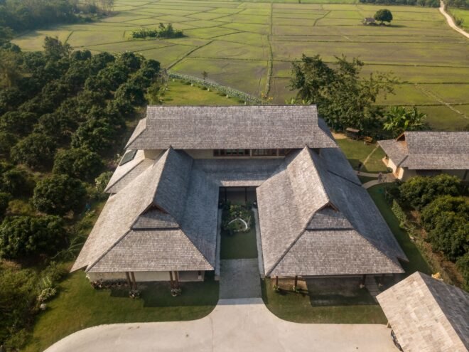 aerial view of home with pitched roofs