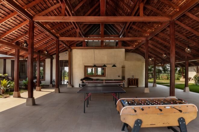 open-air patio with table games