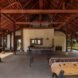open-air patio with table games