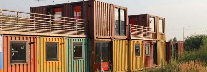 multi-colored shipping containers turned into home