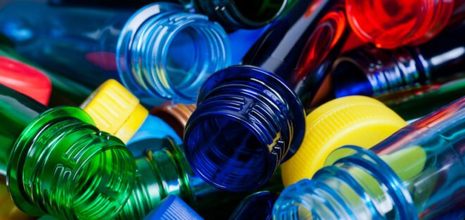 blue, green, red, yellow bottles